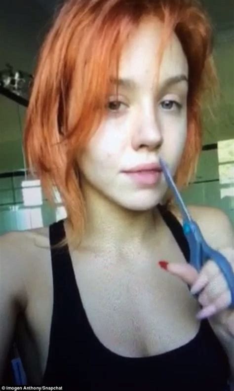 imogen anthony cuts nose hairs with scissors before showing cleavage daily mail online