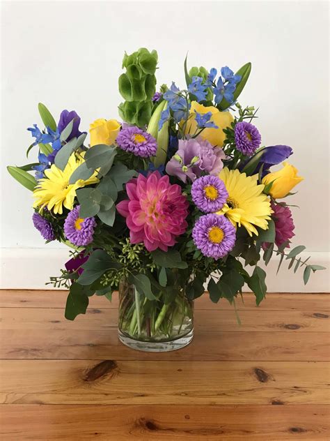 bright cheerful floral vase arrangement frances dunn florist