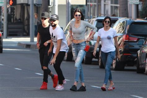 kendall jenner booty in tight ripped jeans out in
