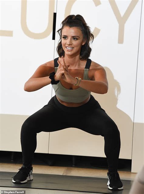 lucy mecklenburgh lifts weights during the launch of her new fitness