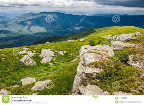 boulders   grassy slope  mountain ridge stock image image