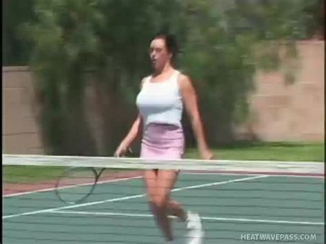 milf playing tennis