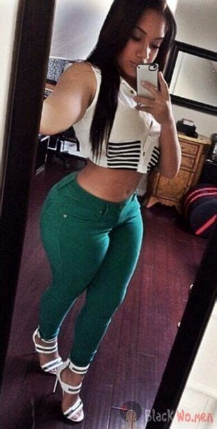 gorgeous black woman taking a selfie in skin tight jeans ass poking out the back muscular curves