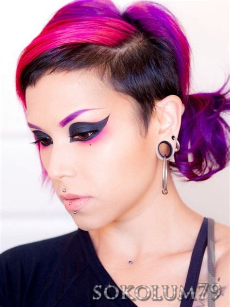 extreme cat eye makeup with purple eyebrows purple eyebrows