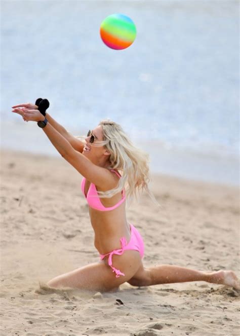bikini wearing blonde charley bond playing beach