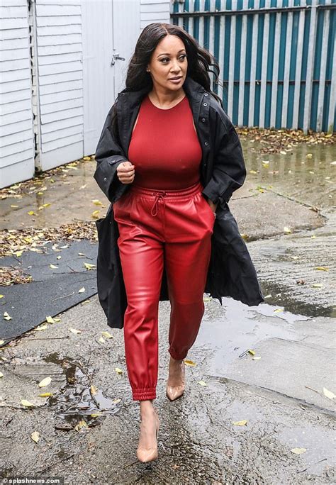 lisa maffia turns heads in a tight red top and matching leather jogging