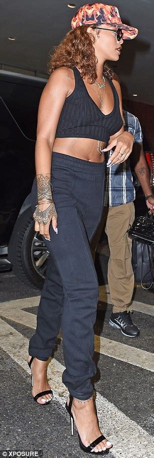 rihanna oozes sex appeal as she shows off her toned midriff in nyc outing daily mail online