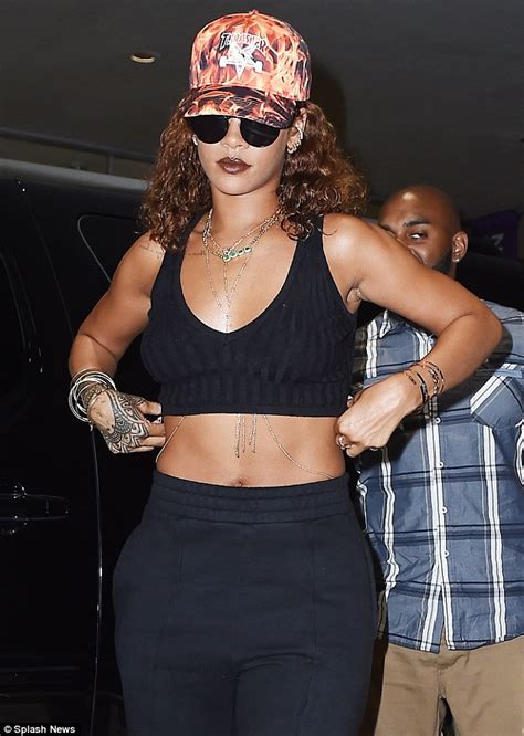 rihanna oozes sex appeal as she shows off her toned midriff in nyc