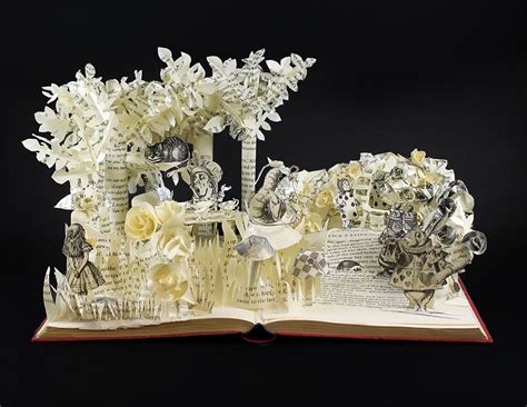 jamie hannigan makes detailed paper sculptures only using the pages of