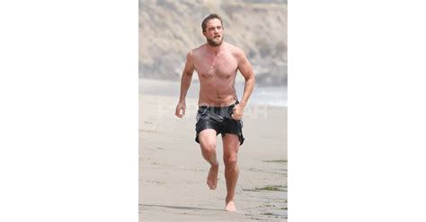 Shirtless Robert Pattinson Plays On The Beach — See Over 100 Pictures