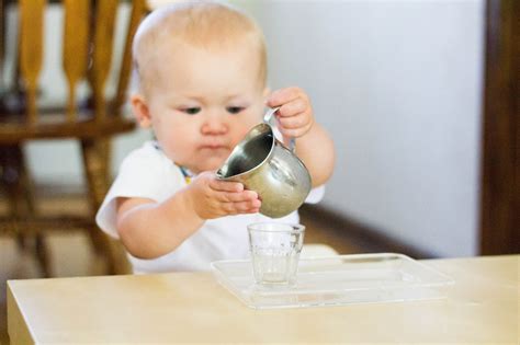 montessori toddler introducing water pouring