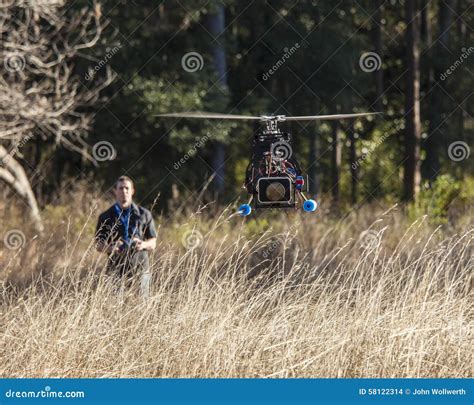 man flying drone stock photo image  dslr surveillance