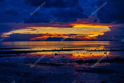 sunsets  beach stock photo  jakgree