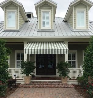 retractable awning private ranch farmhouse exterior jacksonville   coast shade