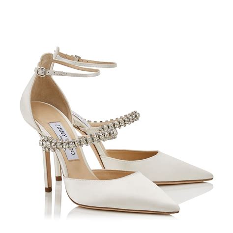 pair  white high heeled shoes