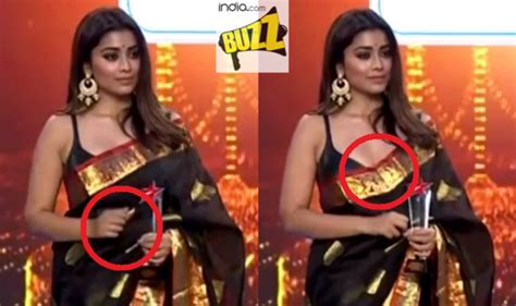shriya saran goes naughty in viral video hot telugu actress pulls down saree to expose her