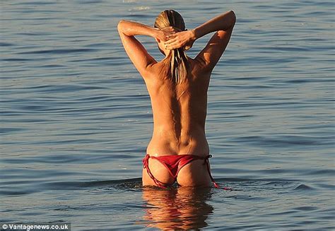 kimberley garner topless sunbathing in mykonos scandal