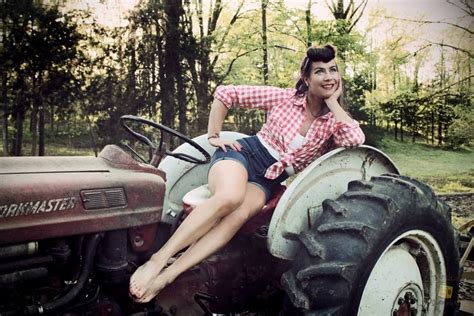 vintage farmer s daughter pin up on tractor cowgirl pinup image by toy robot photography in