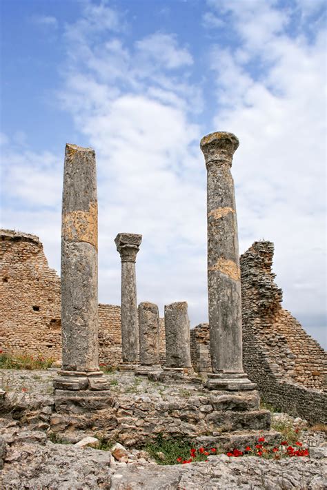 photo roman ruins africa pillar rock   jooinn