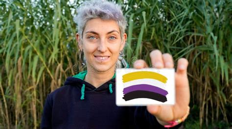 binary person claims gender identity    binary flag stock
