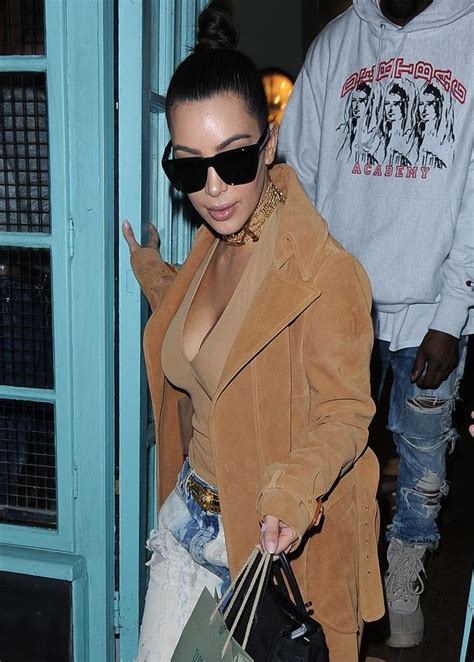 kim kardashian rocks sex choker as she hits vivienne westwood s