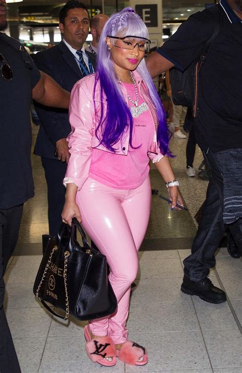 rapper nicki minaj flaunts curves   pink skin tight outfit herald sun