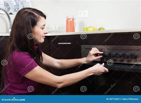 Woman Cooking Something In The Oven Stock Image Image Of Gasstove