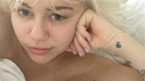 Miley Cyrus Gets Matching Wave Tattoo With Liam Hemsworth