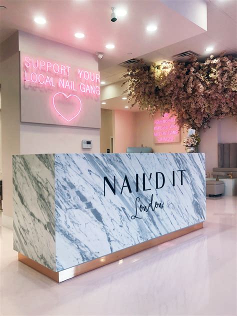 nail salon  marble counter top  neon signs