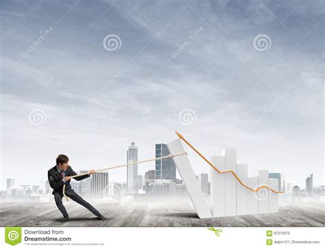 man pulling  effort big pulling rope graph   symbol  financial growth stock image