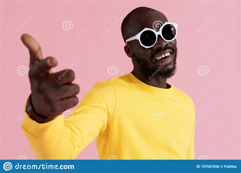 fashion happy black man in sunglasses and sweatshirt portrait stock