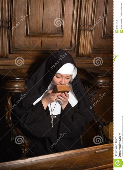 nun kissing prayer book stock image image of antique 31064759