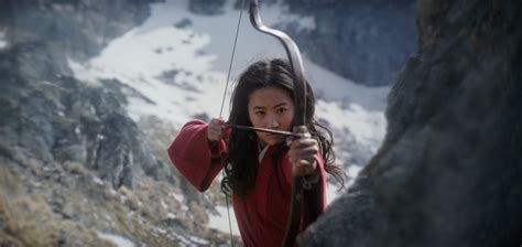 mulan review disneys remake puts  action   action  gate