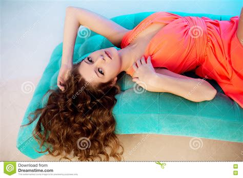 Woman Lying On Sofa In Luxury Interion Beautiful Girl Stock Image