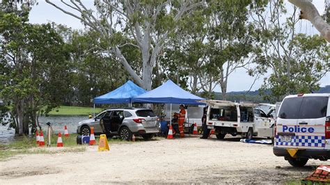 body found in search for hero dad missing at lake tinaroo near cairns