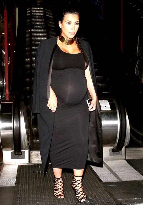 pregnant kim kardashian shops in tight black dress and