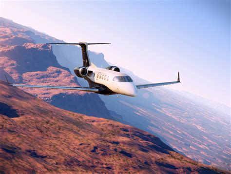 embraer certifies  delivers  phenom  skies mag