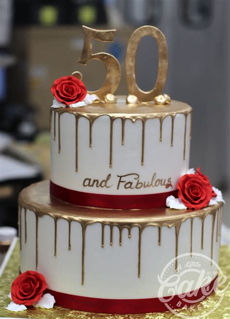 tiered gold drip  birthday cake