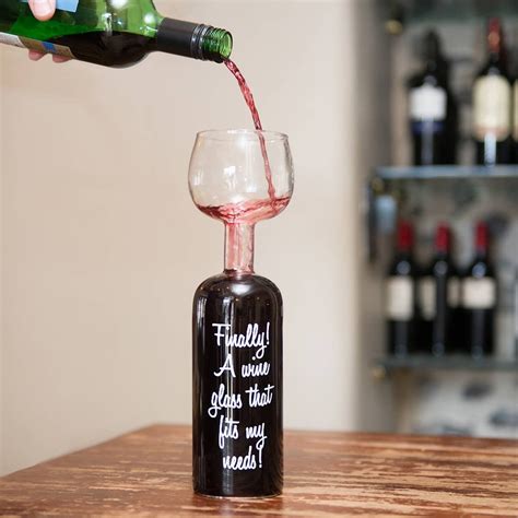 The Wine Bottle Glass Holds A Whole Bottle The Present