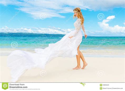 Beautiful Blond Bride In White Wedding Dress With Big Long Train Stock