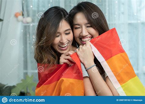 Couple Of Young Asian Lesbian Women Hug Each Other And Holding Lgbt