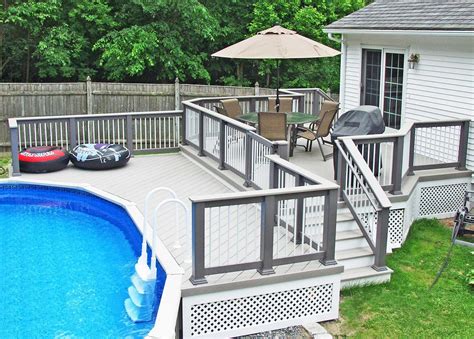 oval  ground pool  decked porch entry  gate pool