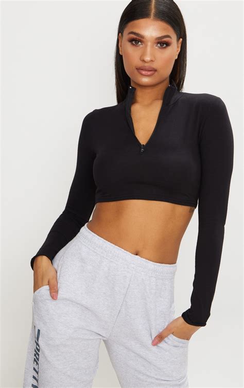 black zip front high neck long sleeve crop top prettylittlething