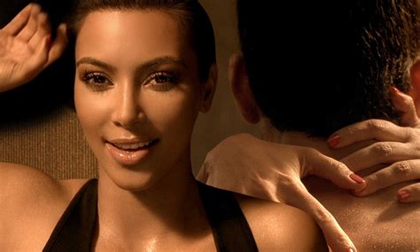kim kardashian strips off and seduces a new man in saucy new super bowl