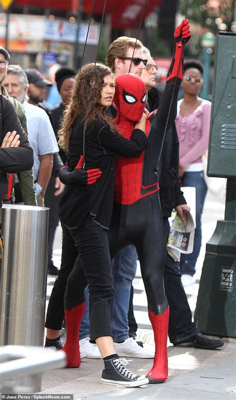 Tom Holland Swings Into Action With Zendaya In His Arms On