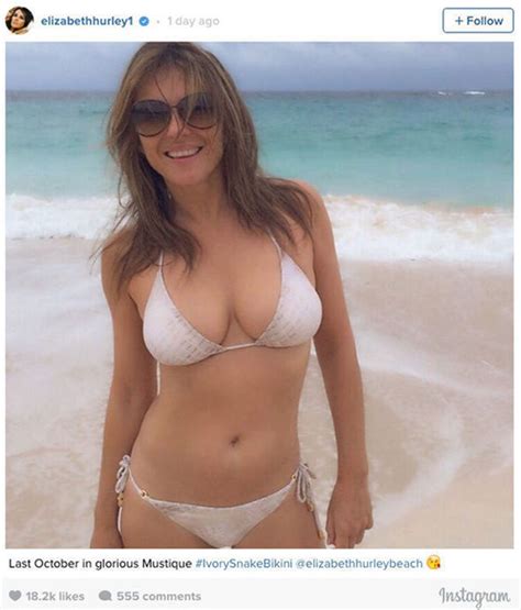 elizabeth hurley 51 oozes sex appeal as her ample bust spills out of