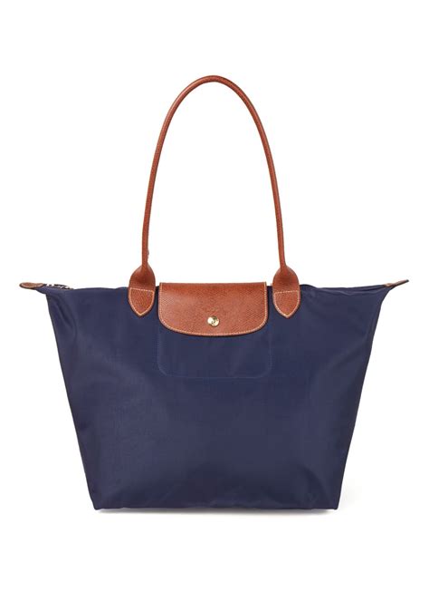 longchamp le pliage schoudertas  met leren details donkerblauw de bijenkorf