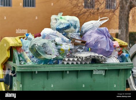 dumpster  full  garbage stock photo alamy