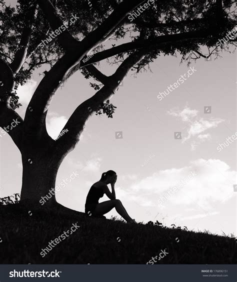 silhouette sad woman sitting  tree  shutterstock