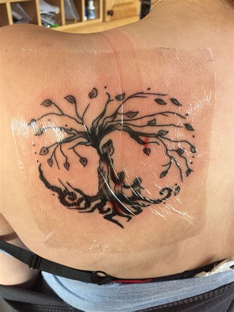 mother and two daughters tattoo heart shaped tattoos